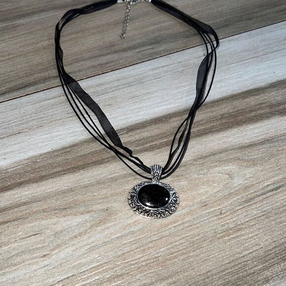Oval Filagree Pendant With Black Center On Cord - Picture 3 of 6